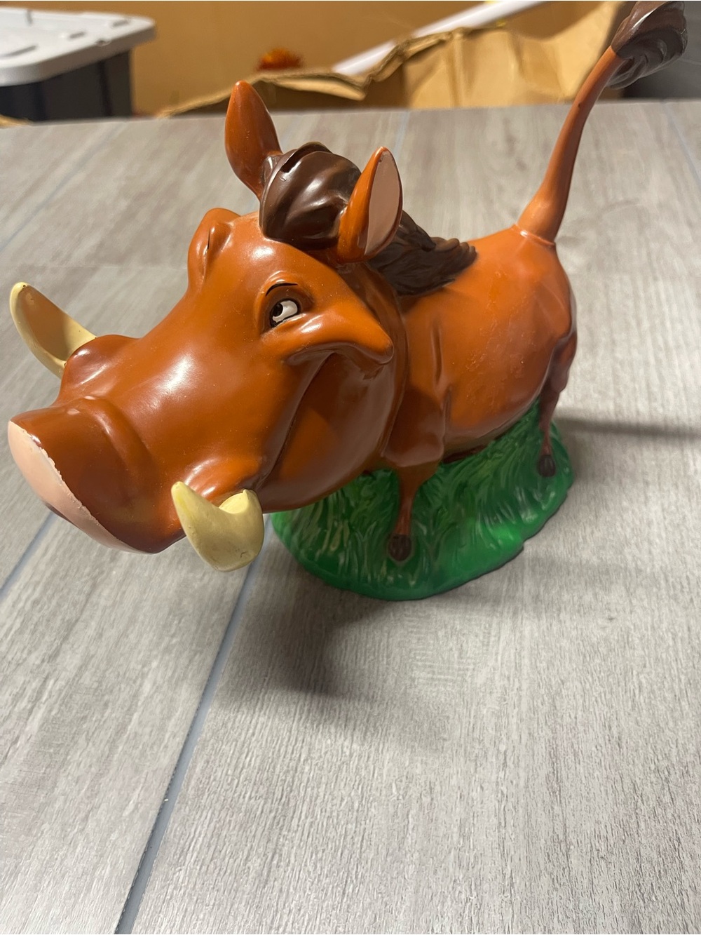 Disney Pumbaa Orange Warthog Vinyl Piggy Bank with Green Base